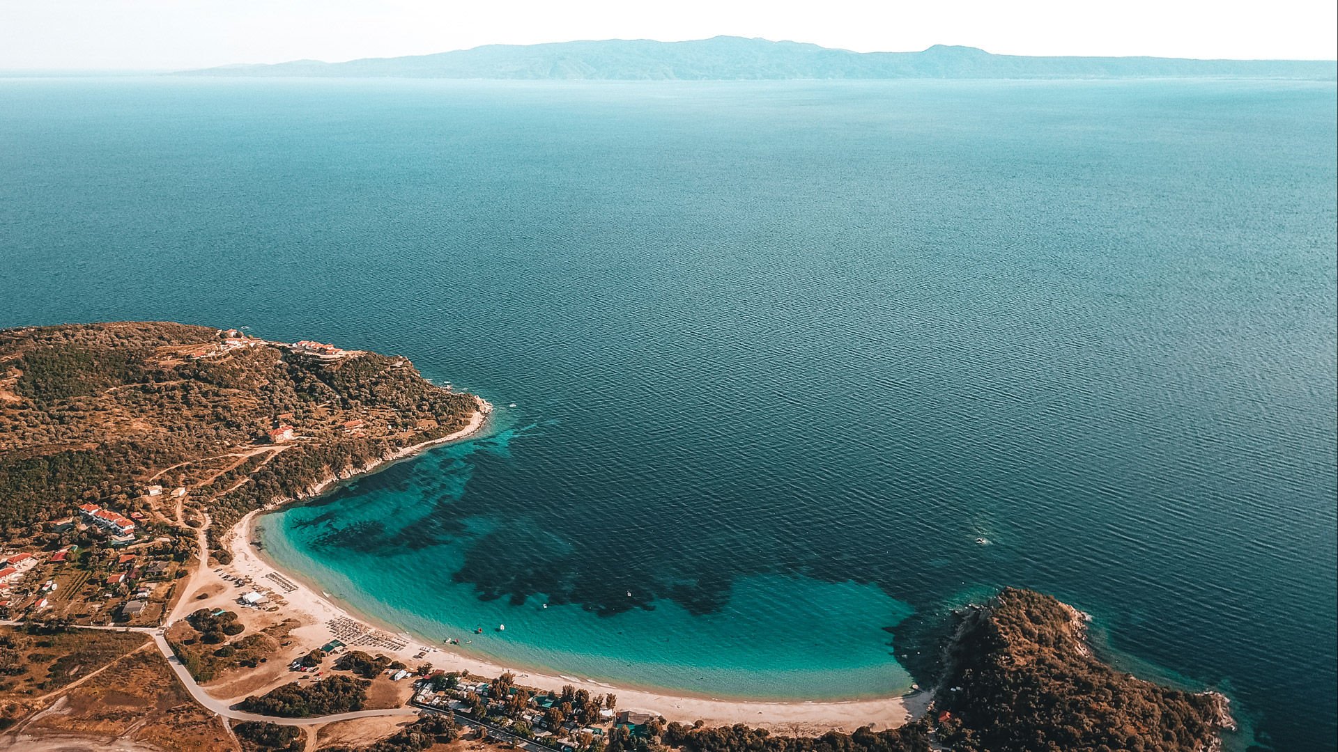 Alikes, one of most beautiful and popular beaches on the island, looking onto the Sithonia peninsula