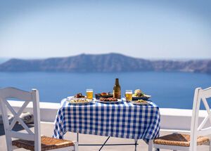 Traditional Greek food on a balcony in Santorini